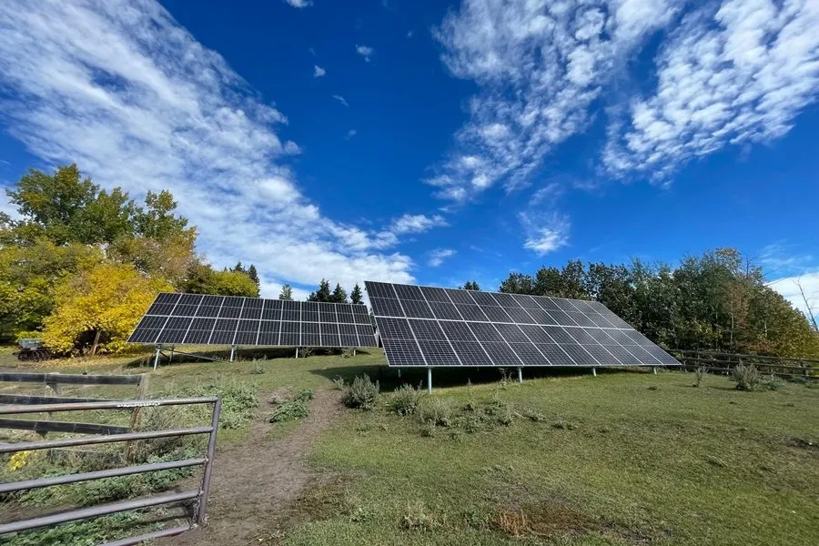 Ground mount solar installation on Patt Gunn's rural Alberta property by Stellar Upgrades