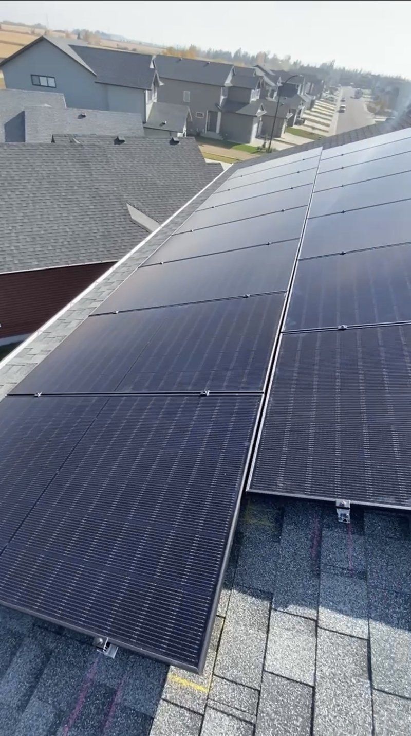 Rooftop solar panel installation in a new subdivision, Alberta by Stellar Upgrades