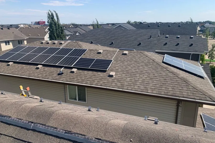 Rooftop solar panel installation on a suburban home, Alberta by Stellar Upgrades