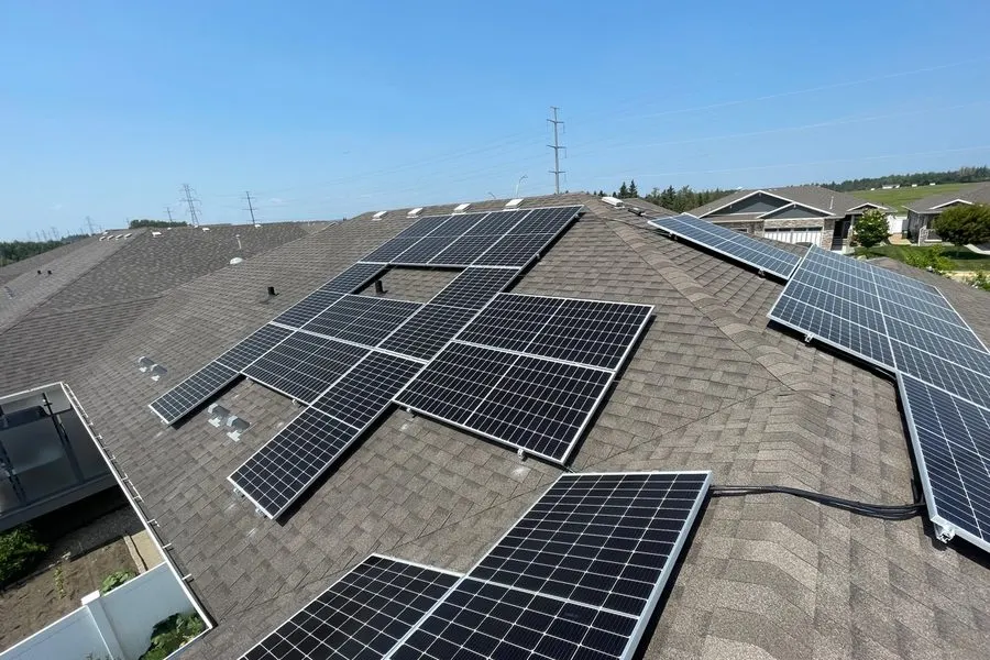 Rooftop solar panel installation in summer, Alberta by Stellar Upgrades